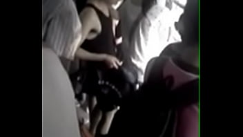 woman groping man in bus