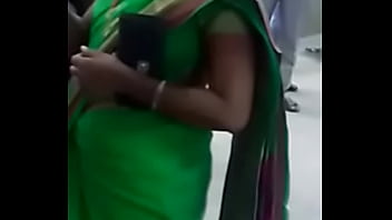 indian aunty lifting her saree up peeing