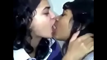 two girls play with each other
