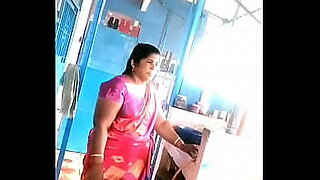 indian aunty striping her saree