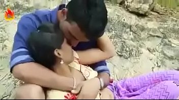 two men sucking and pressing a girls boobs